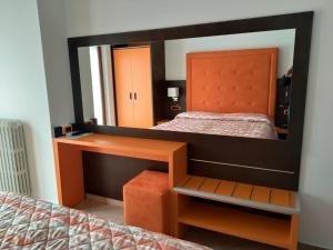 Postel nebo postele na pokoji v ubytování Albergo Casa Este