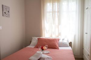 Postel nebo postele na pokoji v ubytování SPYROS APARTMENT
