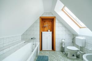 Kúpeľňa v ubytovaní Buzavirág Apartman