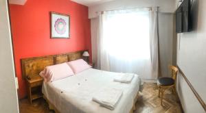 Postel nebo postele na pokoji v ubytování Hotel Mustapic