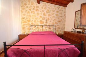 A bed or beds in a room at Dependence Desiree