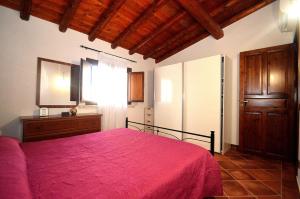 A bed or beds in a room at Dependence Desiree Még 30 kép