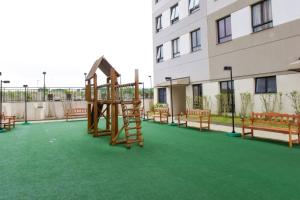 Zona de joacă pentru copii de la Apto com churrasq e sala de massagem em Osasco SP