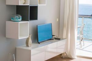 TV a/nebo společenská místnost v ubytování Apartamento Barlovento - PlusHolidays