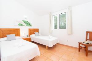 Krevet ili kreveti u jedinici u okviru objekta Villa Ermita by Sonne Villas