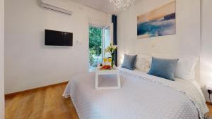 Postel nebo postele na pokoji v ubytování Olive Tree apartment with jacuzzi