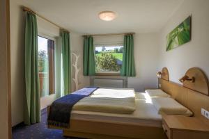 Postel nebo postele na pokoji v ubytování Apartments Woerndle