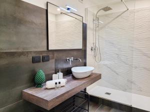 Koupelna v ubytování Residenza Donnafugata B&B + 37 fotografií