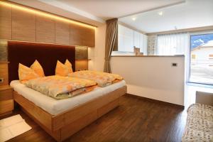 Postel nebo postele na pokoji v ubytování Apartments Mujnei