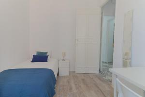 Posteľ alebo postele v izbe v ubytovaní C11 - Cosy 7 Bedrooms in Plaza Merced