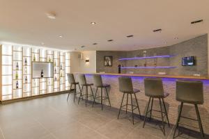 TV a/nebo společenská místnost v ubytování The White House