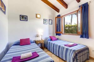 Katil atau katil-katil dalam bilik di Gerard Villa, Cala Blanca
