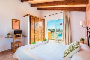 A bed or beds in a room at VILLA CAMPETS