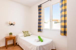 A bed or beds in a room at VILLA CAMPETS