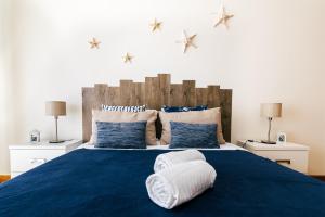 Postel nebo postele na pokoji v ubytování Baleal Beachfront Apartment