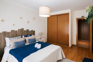Postel nebo postele na pokoji v ubytování Baleal Beachfront Apartment