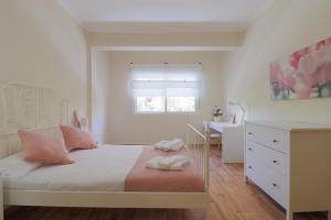 Posteľ alebo postele v izbe v ubytovaní C102 - Huge and Stylish 5 Bedroom by the Center