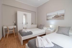 Posteľ alebo postele v izbe v ubytovaní C102 - Huge and Stylish 5 Bedroom by the Center + 17 fotografií