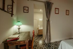 Postel nebo postele na pokoji v ubytování Casa Victoire Ayamonte