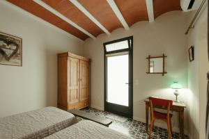 Postel nebo postele na pokoji v ubytování Casa Victoire Ayamonte