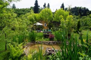 A garden outside Villa River Village