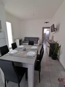 Posedenie v ubytovaní Appartamento Furetto Lido Marini