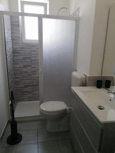 Kúpeľňa v ubytovaní Appartamento Furetto Lido Marini