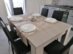 Kuchyňa alebo kuchynka v ubytovaní Appartamento Furetto Lido Marini
