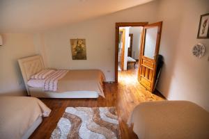 A bed or beds in a room at Villa River Village
