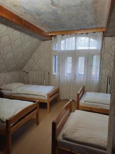 Posteľ alebo postele v izbe v ubytovaní středisko Doubrava