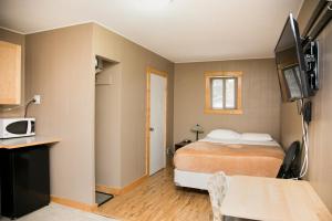 Postel nebo postele na pokoji v ubytování Lone Star Motel