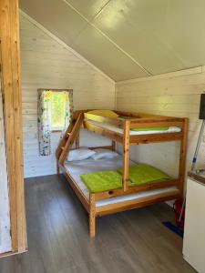 Postel nebo postele na pokoji v ubytování Ylserod Camping