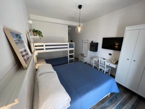Katil dua tingkat atau katil-katil dua tingkat dalam bilik di B&B Fronte Mare