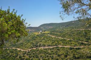 a winding mountain road in the hills at XALAKAS SUMMER HOUSE in Empourios