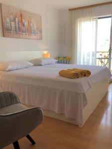 מיטה או מיטות בחדר ב-Apartments Marica