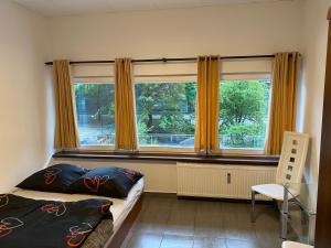 Posteľ alebo postele v izbe v ubytovaní Aparthotel Superjednostka Katowice