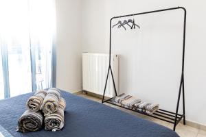 Postel nebo postele na pokoji v ubytování Blaze Studios & Apartments