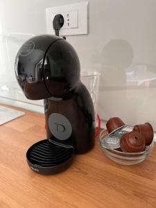 a coffee maker sitting on top of a table at Lemon Tree Dubrovnik Apartments in Dubrovnik