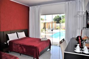 Bazén v ubytování Pousada Suites Bougainville nebo v jeho okolí + 31 fotografií