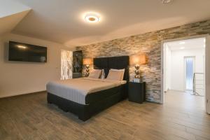 Postel nebo postele na pokoji v ubytování The White House