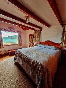 Una cama o camas en una habitación de Hotel Angostura