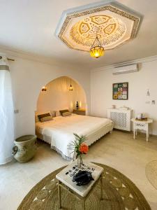Letto o letti in una camera di Dar Colibri - Maison d'hôtes à Kélibia
