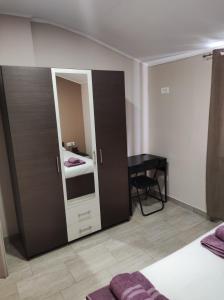 Postel nebo postele na pokoji v ubytování Apartman Tramonto