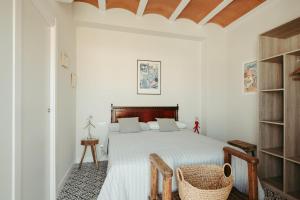 Postel nebo postele na pokoji v ubytování Casa Victoire Ayamonte