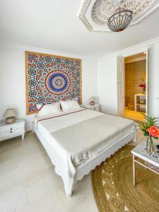 Letto o letti in una camera di Dar Colibri - Maison d'hôtes à Kélibia