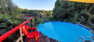 La alberca dentro o cerca de Rio Maullin Lodge