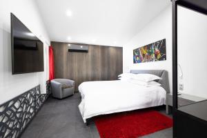 Кровать или кровати в номере THE ADDRESS CASSIS