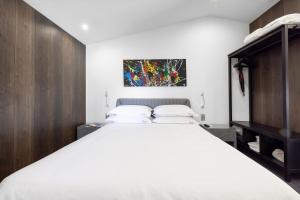 Кровать или кровати в номере THE ADDRESS CASSIS