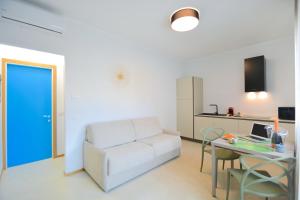 Η κουζίνα ή μικρή κουζίνα στο Prime Blue Suite - Bilocale +3 φωτογραφίες