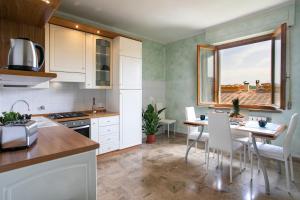 Kuchyň nebo kuchyňský kout v ubytování AM apartment